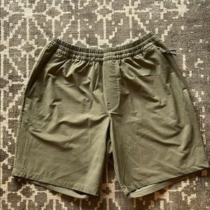 Hill City 8” X-Purpose Short. Size S.  Green with tonal stripes.